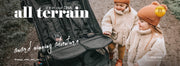 Two toddler girls with nano duo all terrain twin buggy - award winning adventure - all terrain it’s in our DNA - mountainbuggy.com
