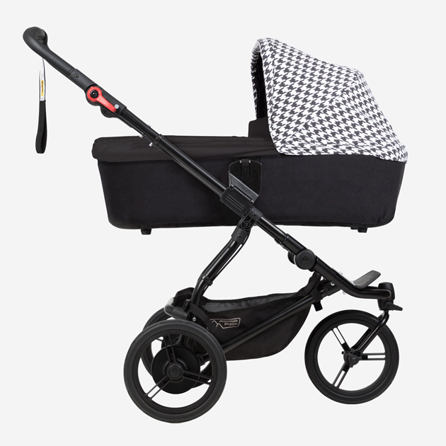mountain buggy swift compact buggy with carrycot plus showing riding modes side view in color pepita_pepita