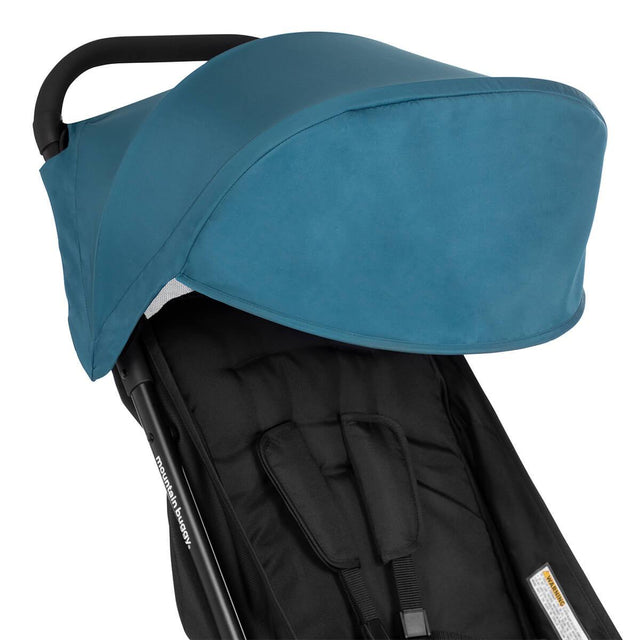 mountain buggy nano travel buggy in colour teal showing close of of fabric hood_teal
