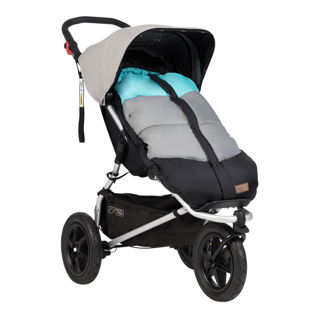 Mountain Buggy durable soft peach lined sleeping bag fitted to an urban jungle in colour ocean_ocean