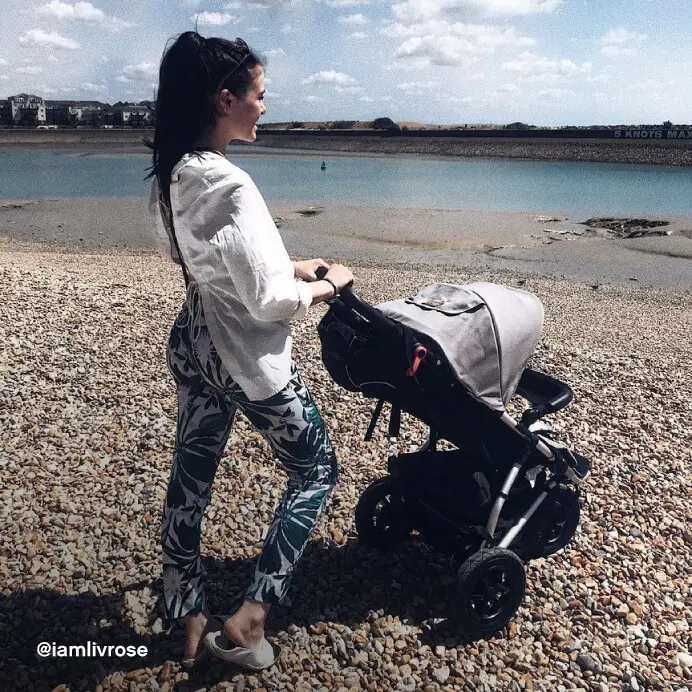 Mountain Buggy urban jungle all terrain 3-wheel pram – mum on a pebbled beach walk