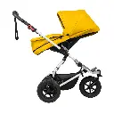 Mountain-Buggy-gold-carrycot-plus-on-swift-buggy-in-parent-facing-mode-side-view.webp